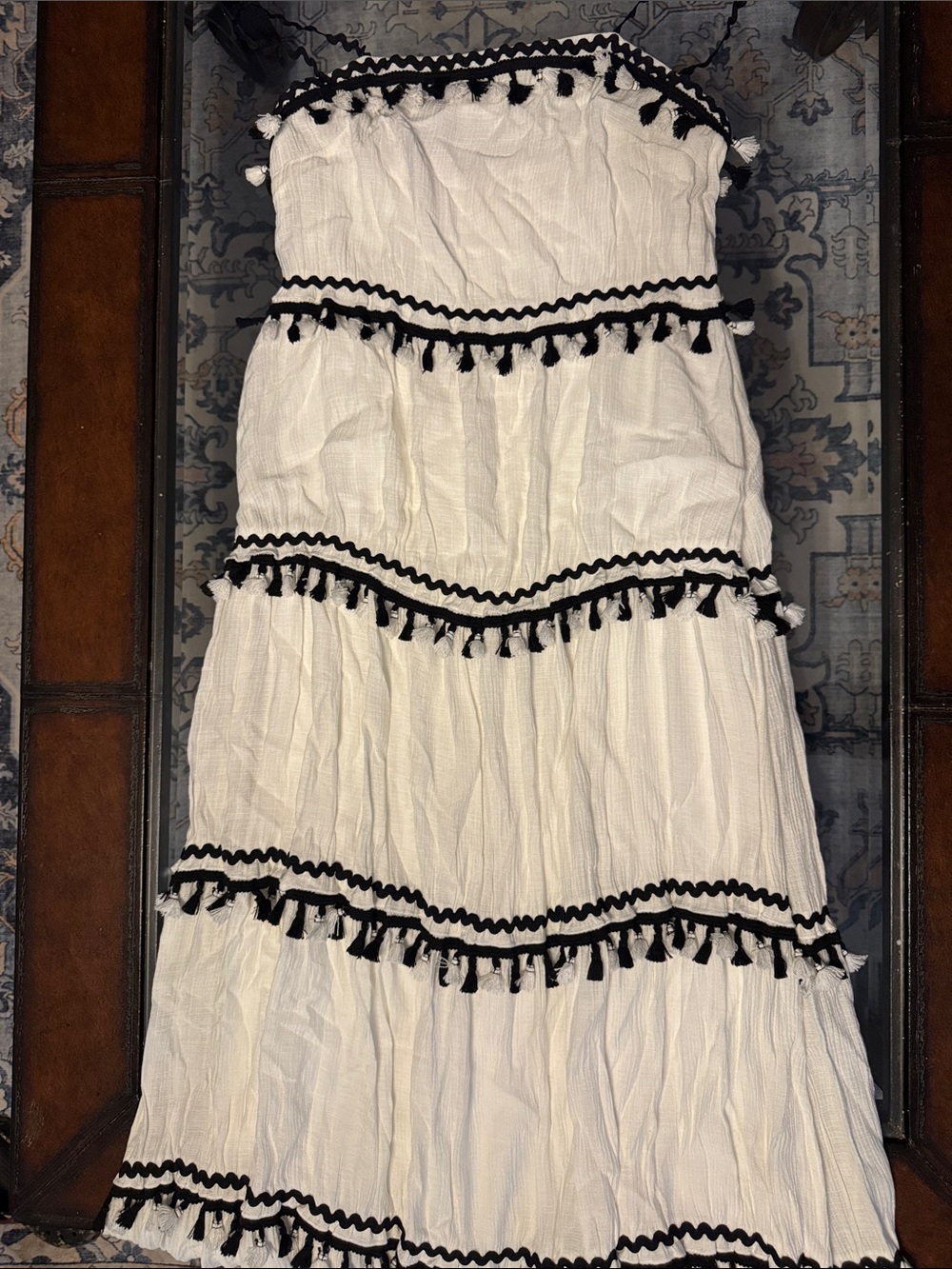 The Impeccable Pig White Strapless Tiered Maxi with Black Tassel Trim